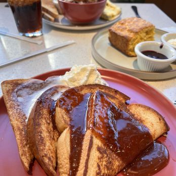 Uptown Yolk - French toast dish with sweet potato biscuit - Southern Near Me - Charlotte, North Carolina Uptown Yolk - French toast dish with sweet potato biscuit - Southern Near Me - Charlotte, North Carolina