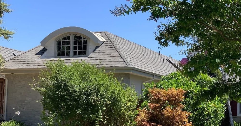 Slide of Exclusively Roofing