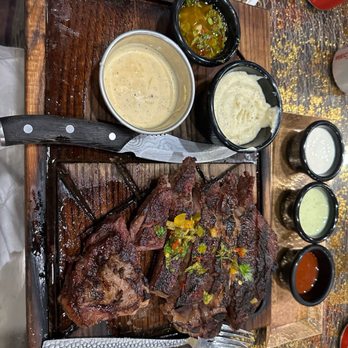 Zaoq 100 - Ribeye Boneless cooked medium well with side salad. - Gelato Near Me - Hicksville, New York Zaoq 100 - Ribeye Boneless cooked medium well with side salad. - Gelato Near Me - Hicksville, New York