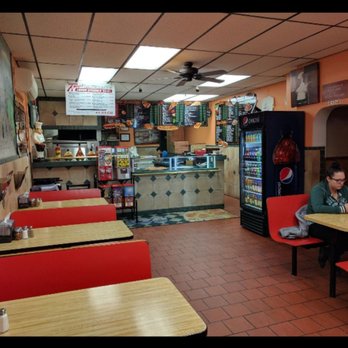 Tonys Pizzeria - a man sitting at a table - Pizza Near Me - Palmerton, Pennsylvania Tonys Pizzeria - a man sitting at a table - Pizza Near Me - Palmerton, Pennsylvania