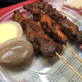 Gene's Chinese Flatbread Cafe - Tea egg and three lamb skewers - Chinese Near Me - Boston, Massachusetts Gene's Chinese Flatbread Cafe - Tea egg and three lamb skewers - Chinese Near Me - Boston, Massachusetts