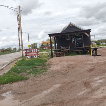 Stompin’ Grounds - a small building on a dirt road - Breakfast & Brunch Near Me - Wall, South Dakota Stompin’ Grounds - a small building on a dirt road - Breakfast & Brunch Near Me - Wall, South Dakota