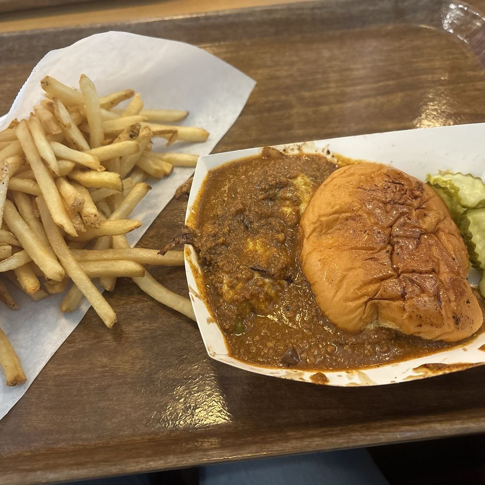 Chili burger and fries. Chili burger and fries.