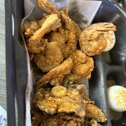 Fried shrimp and oyster platter with boiled eggs. Fried shrimp and oyster platter with boiled eggs.