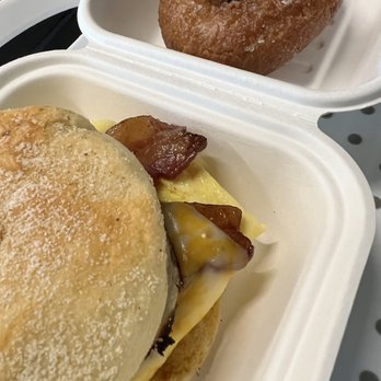 Dylan’s Cottage Bakery & Deli - English muffin breakfast sandwich with a lemon donut. - Bakeries Near Me - Long Beach, Washington