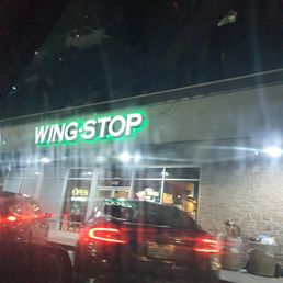Exterior outside entrance of Wingstop - Redwood City, California Exterior outside entrance of Wingstop - Redwood City, California