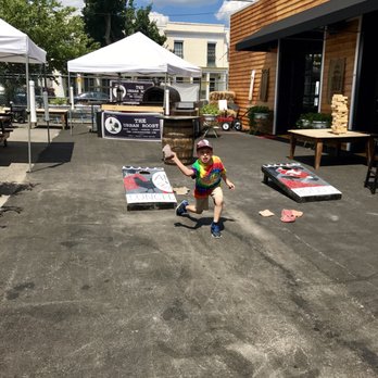 Lunch. Supper! - Playing cornhole in the outdoor area - New American Near Me - Richmond, Virginia