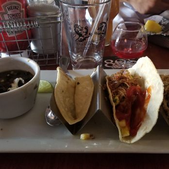 Firestone Walker - Paso Robles - Black beans (soup like consistency) tacos decorated with ketchup to make it look like it was touched - Breweries Near Me - Paso Robles, California