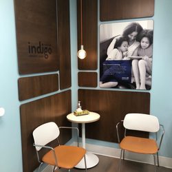 MultiCare Indigo Urgent Care - The seating area in the room the PA saw me in, cute 70s colors and light fixtures