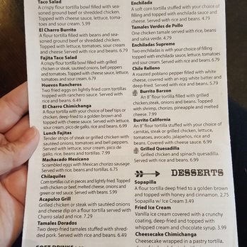 El Charro - a hand holding a menu - Mexican Near Me - Neosho, Missouri El Charro - a hand holding a menu - Mexican Near Me - Neosho, Missouri