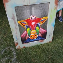 Nampa Festival of Arts - Colorful Bull on an old glass inserted cabinet door.