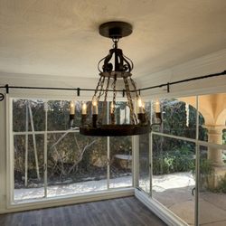 Handyman Alex - Installation of a chandelier and curtains