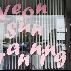 Neon Sun Tanning - Front of building