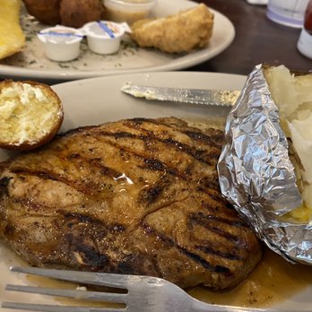 New Orleans Food & Spirits - Hawaiian Pork Chop with Baked Potato! Delicious!! - Seafood Near Me - Covington, Louisiana New Orleans Food & Spirits - Hawaiian Pork Chop with Baked Potato! Delicious!! - Seafood Near Me - Covington, Louisiana