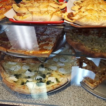 Pizza Corner - Pizza on display. - Pizza Near Me - Medford, New York