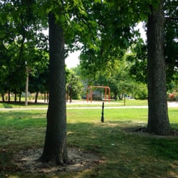 Variety Wonderland Playground - More swings and shade in the back of the park enclosure