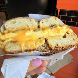 Whole Wheat Everything Bagel with eggs and cheese and bacon. Whole Wheat Everything Bagel with eggs and cheese and bacon.