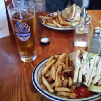 Thirsty Cactus Cantina & Grill - One order on two plates - club sandwich on flatbread with fries. - Mexican Near Me - Dundas, Ontario Thirsty Cactus Cantina & Grill - One order on two plates - club sandwich on flatbread with fries. - Mexican Near Me - Dundas, Ontario