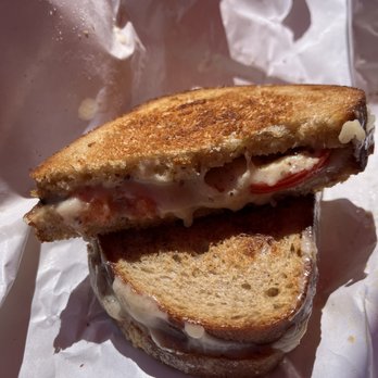 Beecher's Handmade Cheese - Flagship, Basil and Tomato Sandwich. A very nice grilled cheese sandwich. - Cheese Shops Near Me - Seattle, Washington Beecher's Handmade Cheese - Flagship, Basil and Tomato Sandwich. A very nice grilled cheese sandwich. - Cheese Shops Near Me - Seattle, Washington