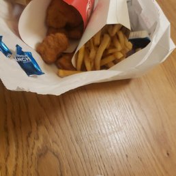 10 piece chicken nugs with a side of large fries. 10 piece chicken nugs with a side of large fries.