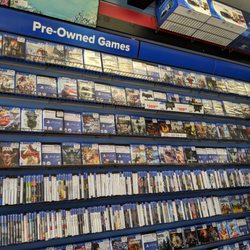 GameStop - Inside. PlayStation games. Pre-owned.