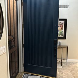 She repaired and repainted my front door.
