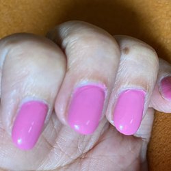 Queen's Nails & Spa - Powder wasn't placed on enough nail, then painted over and paint on cuticles (not cut or pushed back).