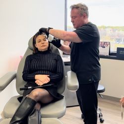 Skintastic Med Spa - Nurse Practitioner, Howard McKay assessing a client