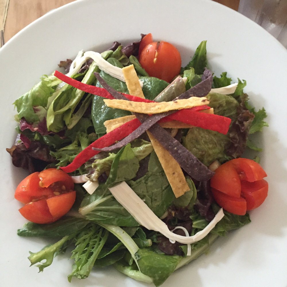 The Blue Parrot - The Oaxaca salad, with a few soggy strips of tortilla and waxy cheese. $14. - Mexican Near Me - East Hampton, New York The Blue Parrot - The Oaxaca salad, with a few soggy strips of tortilla and waxy cheese. $14. - Mexican Near Me - East Hampton, New York