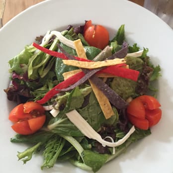 The Blue Parrot - The Oaxaca salad, with a few soggy strips of tortilla and waxy cheese. $14. - Mexican Near Me - East Hampton, New York The Blue Parrot - The Oaxaca salad, with a few soggy strips of tortilla and waxy cheese. $14. - Mexican Near Me - East Hampton, New York