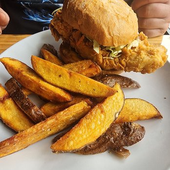 Elixir Mezcaleria - Fried chicken sandwich with fresh cut fries - Latin American Near Me - Gresham, Oregon Elixir Mezcaleria - Fried chicken sandwich with fresh cut fries - Latin American Near Me - Gresham, Oregon