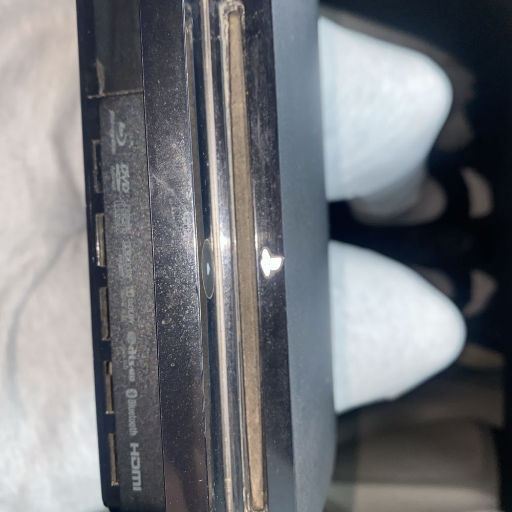 uBreakiFix by Asurion - Dust in disc reader. - Mobile Phone Repair Near Me - Miami, Florida