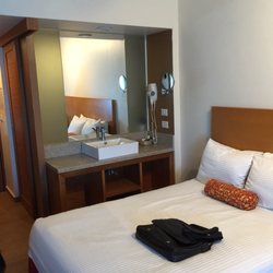 Hotel Aranzazu - Bed with sink right by it.