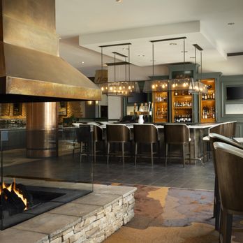 Flatz Restaurant and Lounge - Flatz Lounge, showcasing seating as well as fireplace - New American Near Me - Broomfield, Colorado Flatz Restaurant and Lounge - Flatz Lounge, showcasing seating as well as fireplace - New American Near Me - Broomfield, Colorado