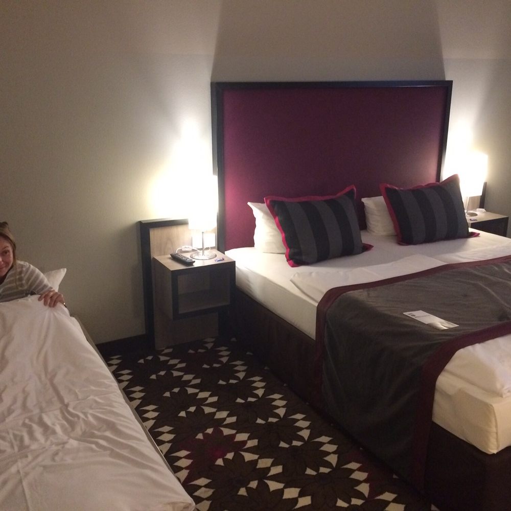 Mercure Hotel MOA Berlin - Two people can fit in the bed and there was a smaller cot to the side. - Hotels Near Me - Berlin, BE
