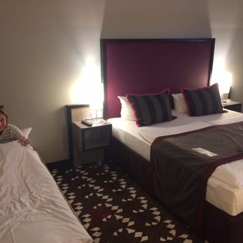 Mercure Hotel MOA Berlin - Two people can fit in the bed and there was a smaller cot to the side. - Hotels Near Me - Berlin, BE