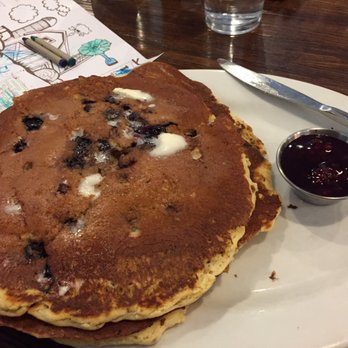 First Watch - Blueberry pancake on top. Banana granola crunch pancake on the bottom. - Breakfast & Brunch Near Me - Kennesaw, Georgia