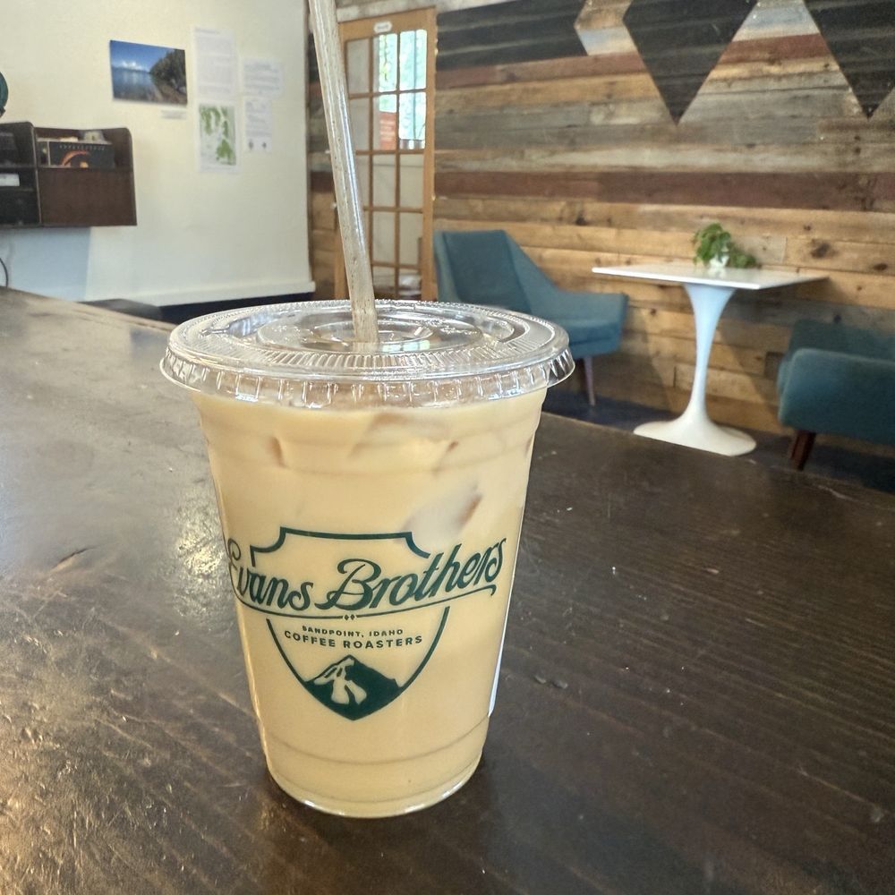 Evans Brothers Coffee - Iced Americano with cream and raspberry - Coffee & Tea Near Me - Sandpoint, Idaho Evans Brothers Coffee - Iced Americano with cream and raspberry - Coffee & Tea Near Me - Sandpoint, Idaho