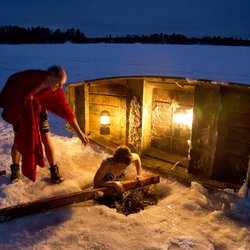 Wintergreen Northern Wear - Jumping in a hold in the ice after a sauna