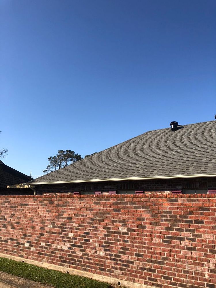 Slide of Pelican Roofing Company