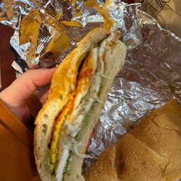 Egg cheese avocado on Portuguese roll. Salt pepper ketchup!!! Egg cheese avocado on Portuguese roll. Salt pepper ketchup!!!