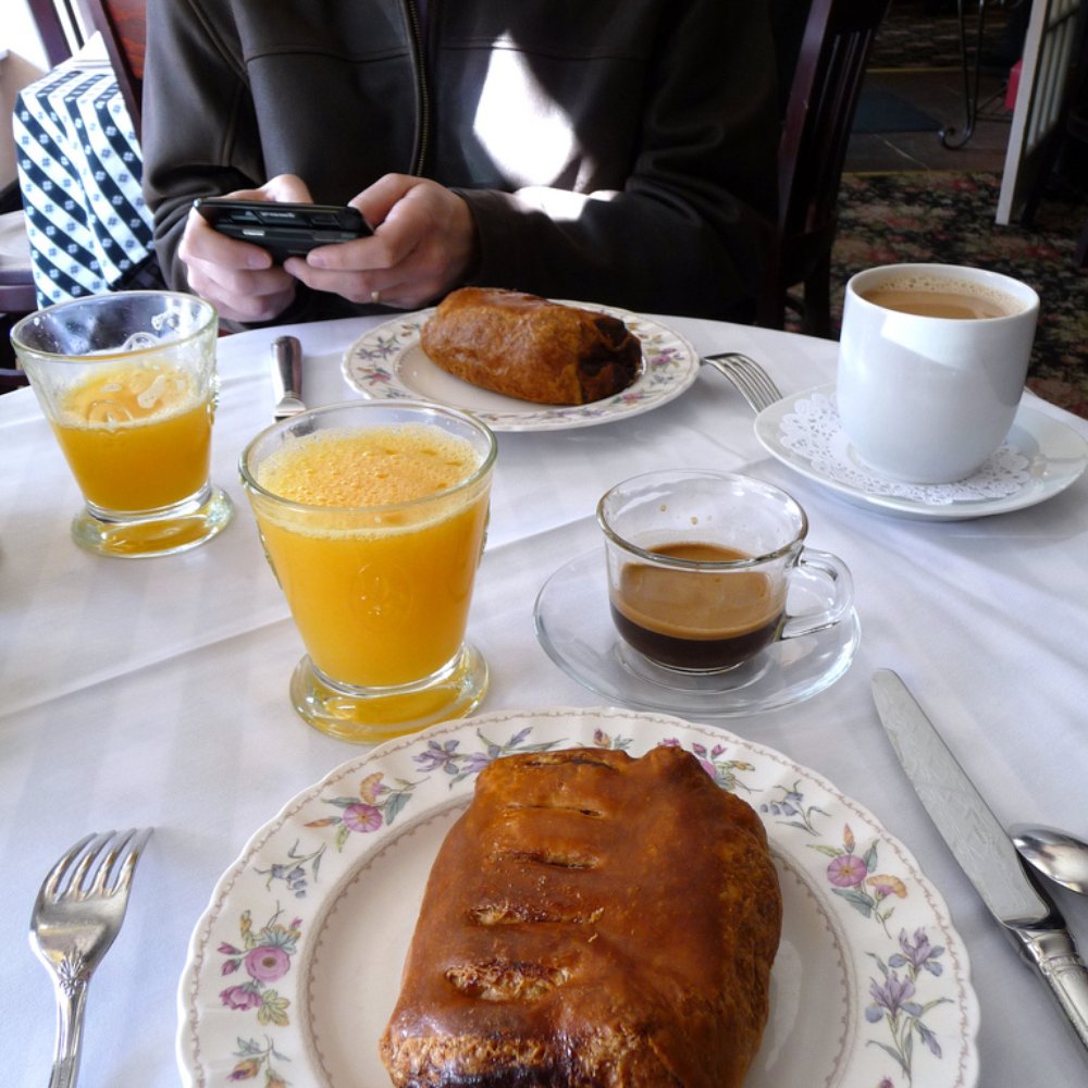 Suzette's Creperie - Petite Dejeuner. Pain au chocolat, freshly squeezed orange juice, cafe au lait. - French Near Me - Wheaton, Illinois
