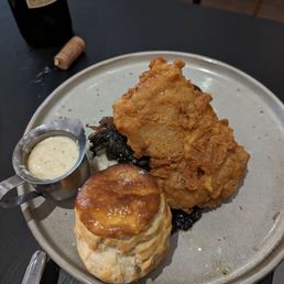 Smoked fried chicken comes with biscuit, mashed potatoes, and collard greens
