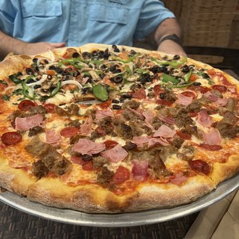 Serafina’s Pizzeria - The pie my friend ordered. Leftovers for days!!! - Pizza Near Me - St Johns, Florida Serafina’s Pizzeria - The pie my friend ordered. Leftovers for days!!! - Pizza Near Me - St Johns, Florida