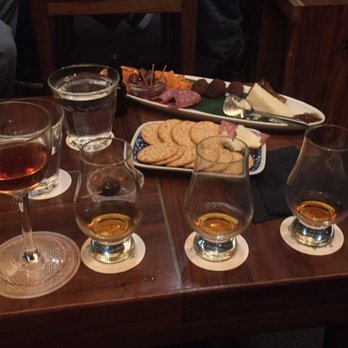 Bar Leather Apron - A little Whiskey sampler and some cheese and salami and fruit to pair everything - Cocktail Bars Near Me - Honolulu, Hawaii