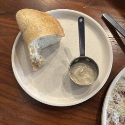 Warm bread basket and garlic spread Warm bread basket and garlic spread