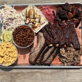 Steel Belly Barbecue - Craft barbecue tray including brisket, ribs, pulled pork, burnt ends, Mac n cheese, slaw, loaded potato salad, bbq beans and more! - Food Trucks Near Me - Algoma, Wisconsin Steel Belly Barbecue - Craft barbecue tray including brisket, ribs, pulled pork, burnt ends, Mac n cheese, slaw, loaded potato salad, bbq beans and more! - Food Trucks Near Me - Algoma, Wisconsin