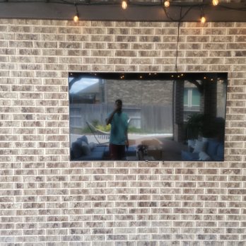 Handyman and Sam - Tv mounting on brick - General Contractors Near Me