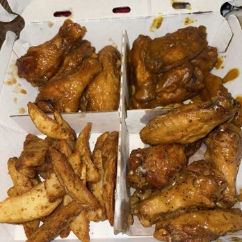 Buffalo Wild Wings 'GO' - Thai curry wings,lemon pepper wings ,garlic wings - Sports Bars Near Me - Jamaica, New York