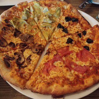 Zafferano Ristorante - Quattro stagioni (mushroom, artichoke, olive & prosciutto) - Italian Near Me - Woodbridge, Ontario Zafferano Ristorante - Quattro stagioni (mushroom, artichoke, olive & prosciutto) - Italian Near Me - Woodbridge, Ontario